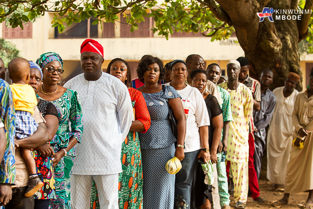 Akinwunmi Ambode and his wife, Bolanle Ambode on Queue at Ward A5 - Unit 33 Polling Centre in Ogunmodede Secondary school for Accreditation